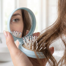 Handy pop up hair brush with mirror for travel and office