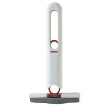 A white and red mini mop with a grey sponge head stands upright on a plain white background.