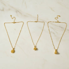Stylish gold finish necklace accessory with intricate detailing