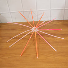Children enjoying glow stick lights at party