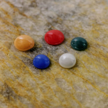 Natural Panch Ratna stones glowing with inherent colors, promoting positivity.