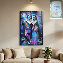 Close-up of the vibrant Radha Krishna artwork on the wall frame