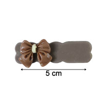 Size reference image showing length of bow hair clips measuring 14 cm