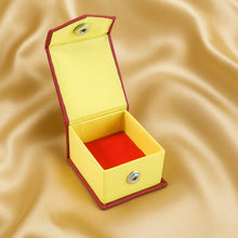 Open ring gift box showing soft velvet cushion and snap closure