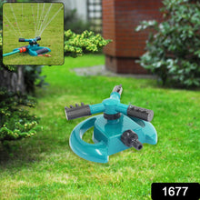 A teal and black garden sprinkler sits on a lawn with a smaller inset image of it in use.