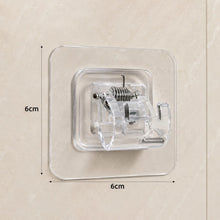 Size reference of transparent self-adhesive wall hook on white background