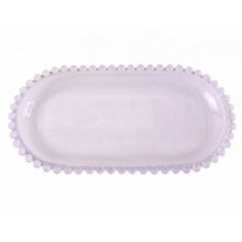 Transparent oval glass tray for serving snacks and sweets