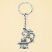 Om Shivling metal keychain showing sturdy chain and strong ring