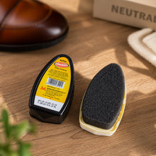 Portable shoe shiner liquid for quick shine, showing its sleek bottle.