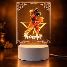Lord Ram 3D LED lamp with a warm orange light, showing a divine figure with a bow and arrow, in a dark setting.