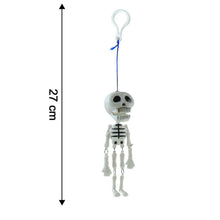 Hanging skeleton keychain as a bag charm