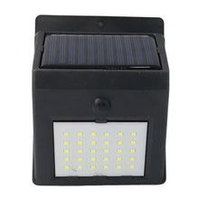 Front view of the black solar-powered wall light with 30 LEDs, featuring a solar panel on top and a motion sensor below.