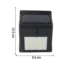 Bright white LED solar powered motion sensor wall light for home entrance