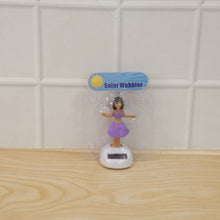 Solar activated dancing doll for car dashboard and desktop decor