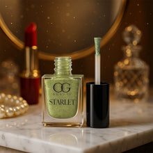 Close-up of gold sparkle nail paint providing high-shine finish