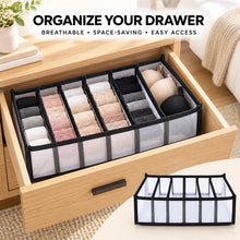 A drawer organizer filled with socks, underwear, and bras in a light wooden drawer, with text 