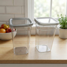 Multiple plastic kitchen containers stacked for compact storage