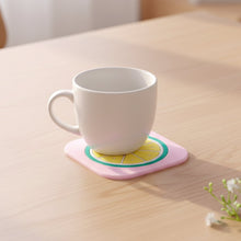 Selection of colorful fruit-themed silicone drink coasters including lemon design