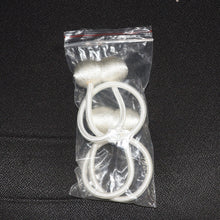 Elegant magnetic curtain tiebacks in a home setting, styling a window.