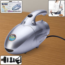 Front view of Orbit handheld mini vacuum cleaner showing ergonomic design