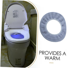 A modern white toilet with a blue light inside, next to a light grey elastic toilet seat cover and text.