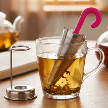 Close-up of the ultra-fine mesh filter on the umbrella-shaped tea strainer, perfect for loose leaf tea.