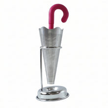 Stainless steel umbrella tea infuser resting securely on its dedicated drip tray stand, preventing spills.