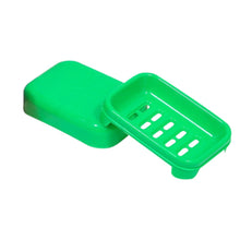 The covered soap case features a ventilated base for quick drying.