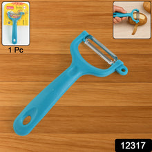 Ergonomic vegetable peeler with a plastic handle, shown from a different angle.