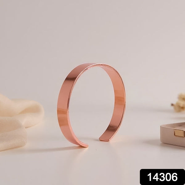 Rose gold kada bracelet displayed on a stand
