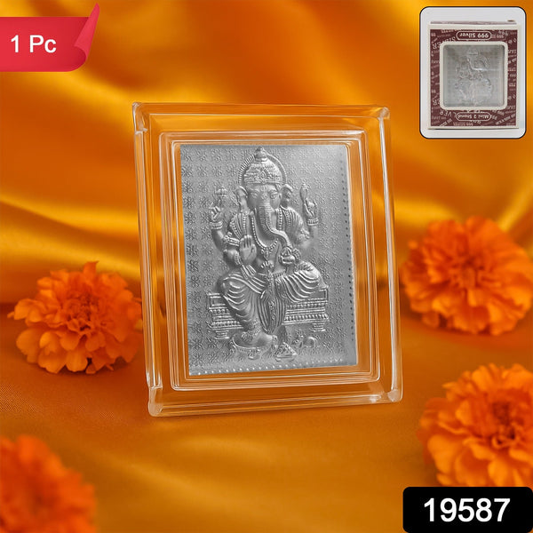 Silver-plated Ganesha idol in an acrylic frame, with a '1 Pc' label and a small inset image of the product box.