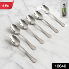 Six stainless steel dining spoons neatly arranged in a set