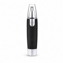Hand holding the compact painless grooming device for nose and ear hair removal.