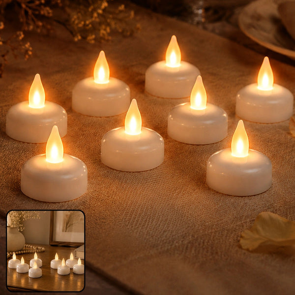 Eight white LED tealight candles with warm yellow flickering flames, arranged on a beige textured surface.