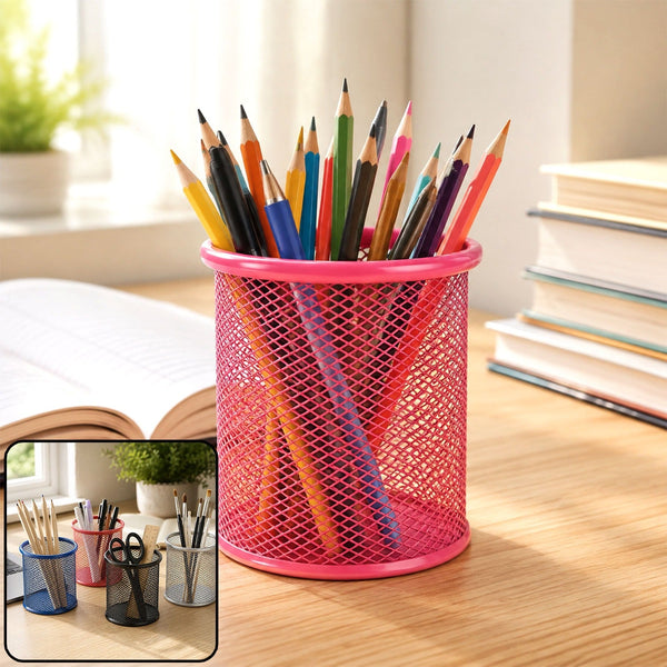 A vibrant pink metal mesh pen holder filled with colorful pencils on a wooden desk with an open book.