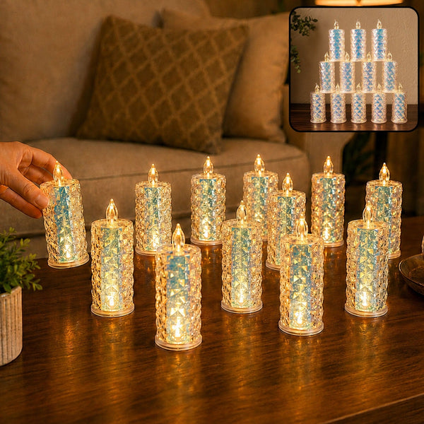 A hand reaches for one of twelve glowing, textured LED candles arranged on a wooden table, with a blurred couch in the
