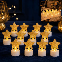 Twelve LED tealights with golden mesh stars on a dark blue tablecloth, with a blurred background.