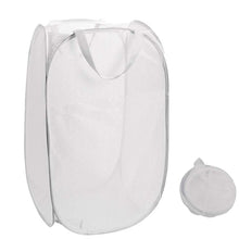 Organizing clothes with collapsible mesh laundry hamper