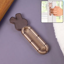 Self stick cabinet handle attached to a smooth cabinet door
