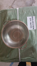 Angled view of the elegant stainless steel strainer bowl, perfect for Indian kitchens.