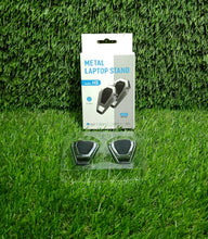 Versatile metal stand holding both a laptop and a tablet, showcasing its multi-device compatibility.