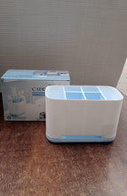 Durable ABS plastic toothbrush holder stand with clearly visible storage slots