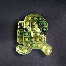 In-use live image demonstrating stress relief with silicone Pop It Fidget Toy
