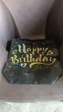 Additional angle showing reusable black and gold birthday gift bag