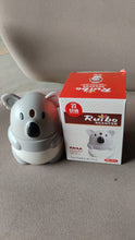 Vertical image of koala toothpick holder dispenser on kitchen counter