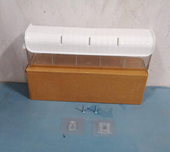 A wall mount drawer organizer shown with its adhesive backing for easy, drill-free setup.