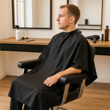 Water-resistant hair cutting gown for salon or home grooming