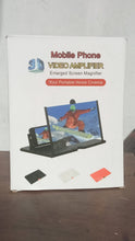 Adjustable mobile screen amplifier reducing eye strain while watching videos.