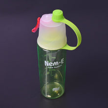 A sports water bottle mounted on a bicycle, demonstrating its perfect fit for cycling enthusiasts.