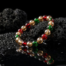 Close-up of high-shine multicolor beads on stretch bracelet for women